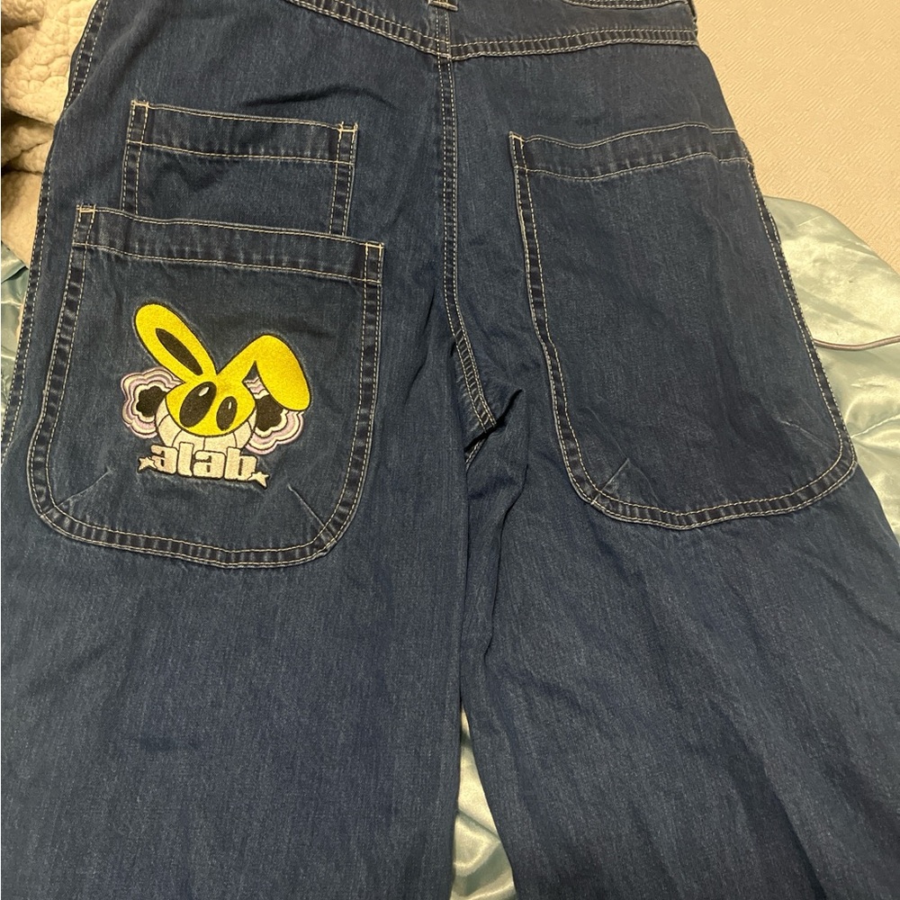 Zumiez Relaxed Fit Jeans with Yellow Graphic